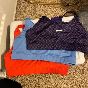 3 women’s size M Nike sports bras